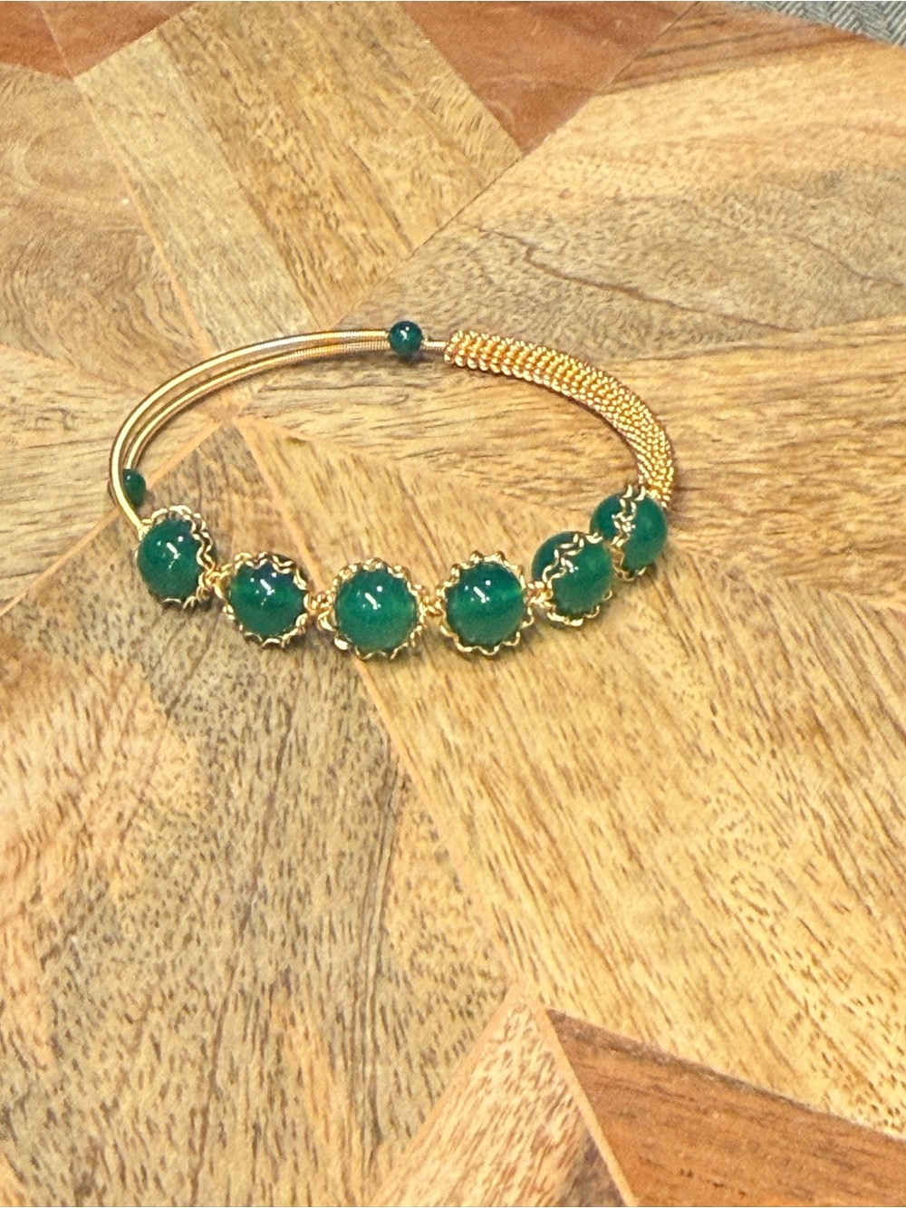 Gold Bracelet with Green Cabochon Flowers